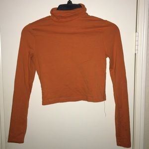 Cropped orange turtle neck